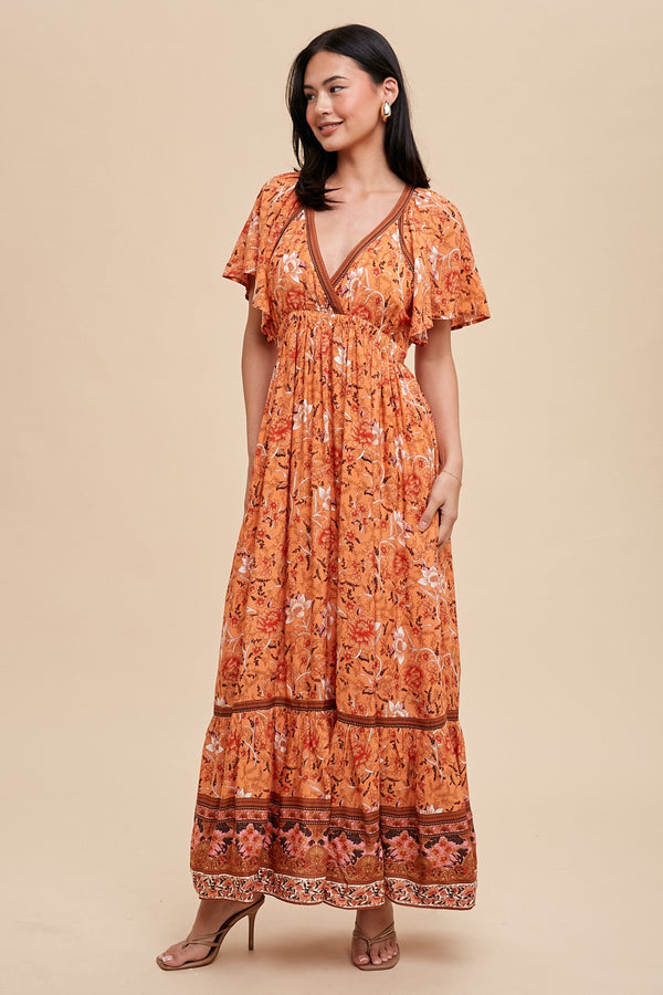 BORDER PRINT FAUX SURPLICE WRAP MAXI in Apricot Crush