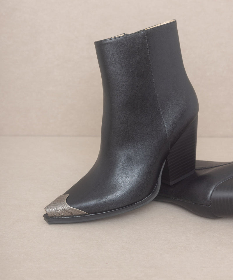 The Zion Black | Elegant bootie with etched metal toe | by Oasis Society